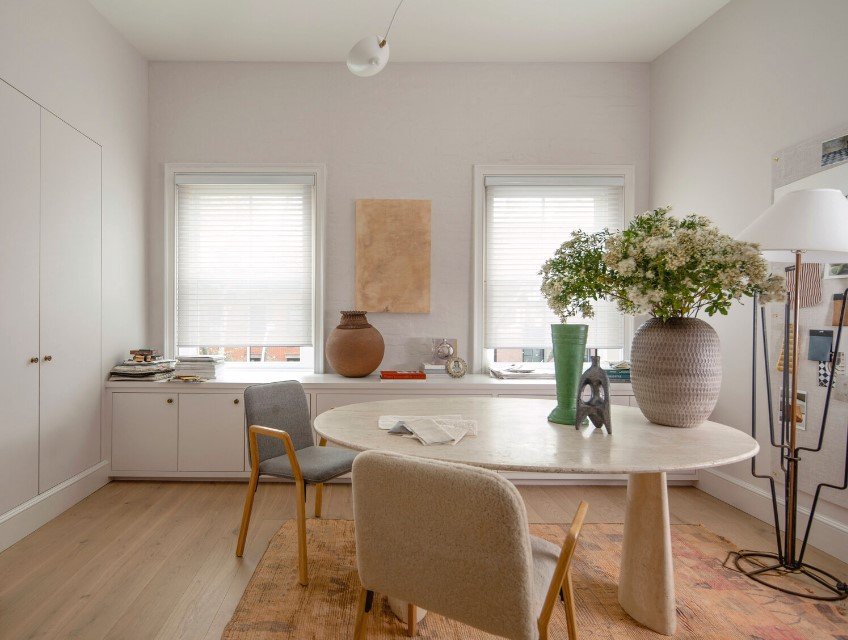 Elegant light filtering roller shade on a window, gently diffusing natural light while maintaining privacy and enhancing the room's ambiance through a modern window treatment.