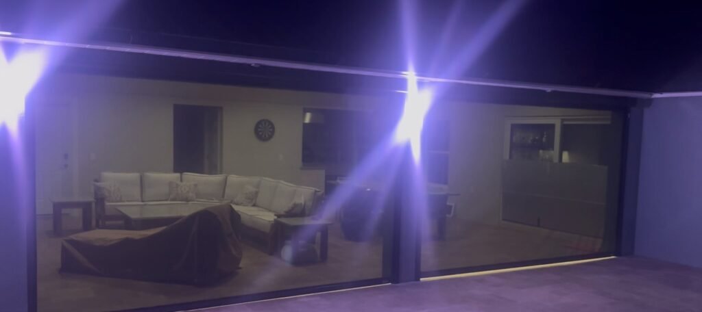 Stylish motorized screens for lanai offering a modern shade solution to enhance comfort and control.