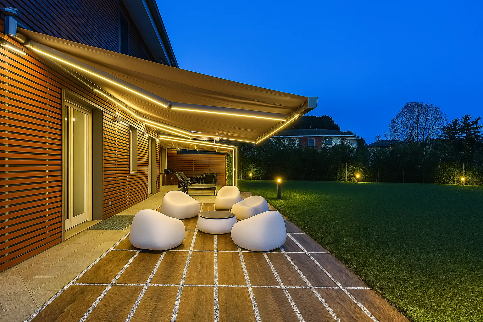 Elegant patio with ambient lighting and retractable shade system