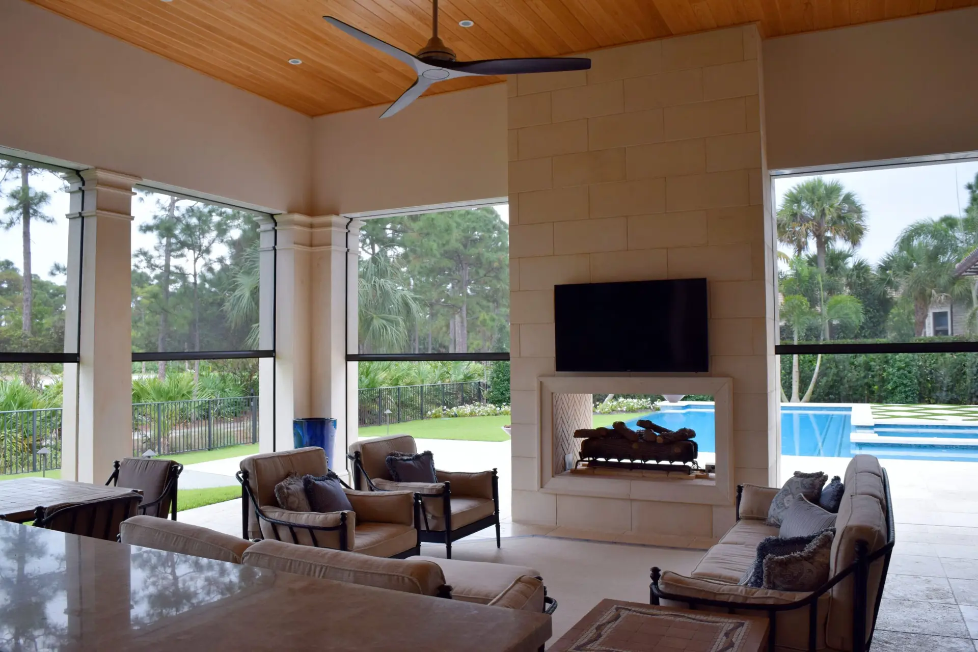 Fenetex retractable lanai screen system blending durability, elegance, and smooth motorized operation for residential outdoor spaces.
