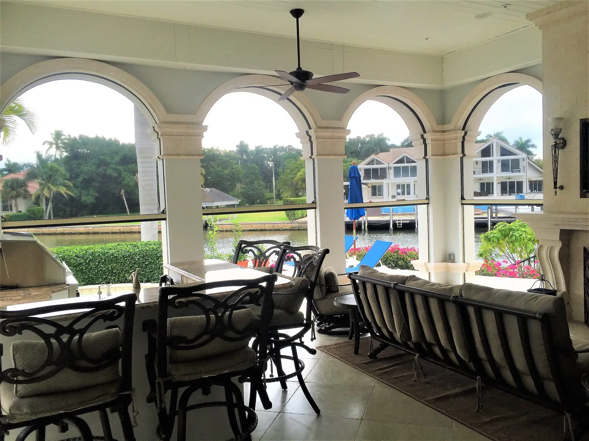 Sleek Progressive MagnaTrack motorized screens integrated into modern home architecture for seamless design and comfort.