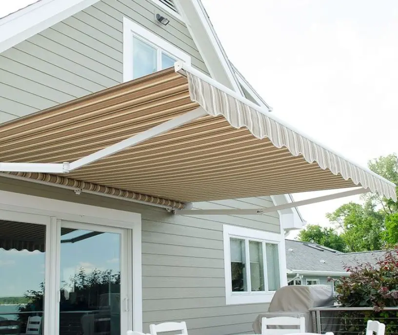 Motorized retractable patio awning providing adjustable shade and UV protection for outdoor comfort and entertaining.