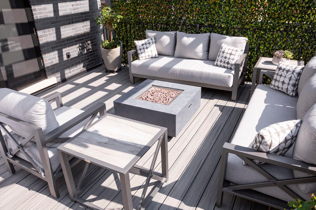 DecoScape outdoor seating area with modern patio furniture arranged for comfort and style in a Florida backyard.