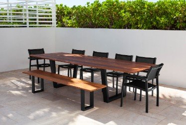 Elegant custom outdoor dining set featuring premium materials and contemporary design, perfect for upscale patio and lanai spaces.