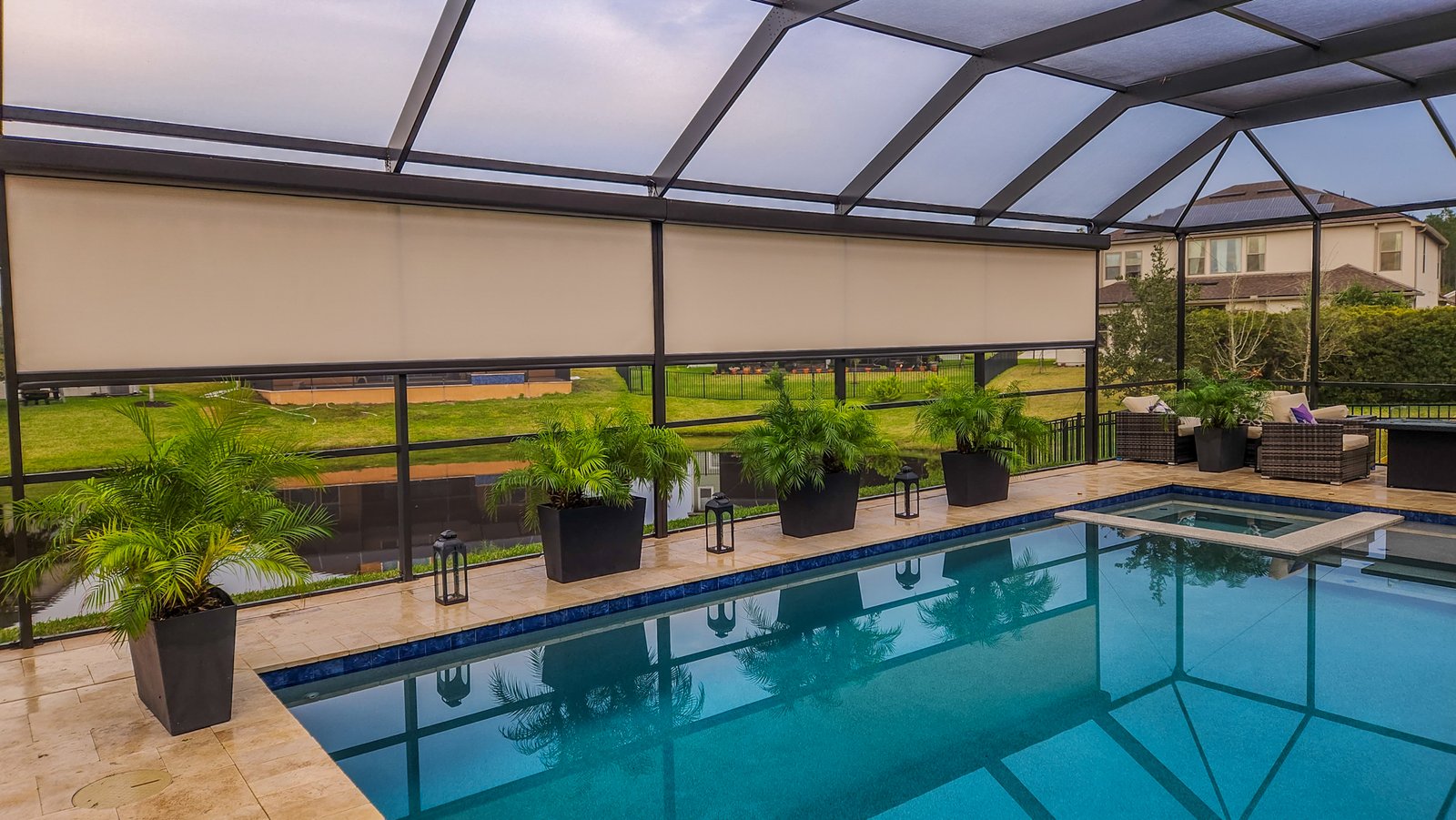 Motorized screens on pool cage for privacy