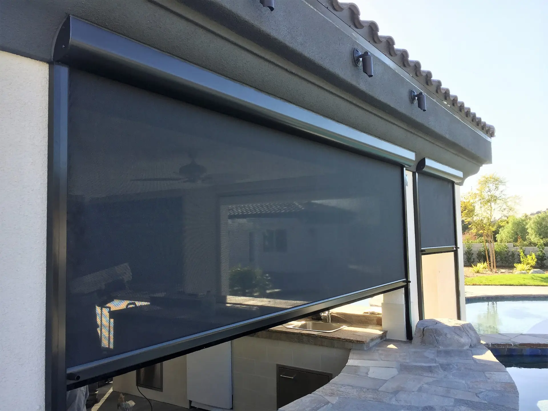 Custom retractable patio screens help you enjoy fresh air while reducing sun exposure and keeping insects out.