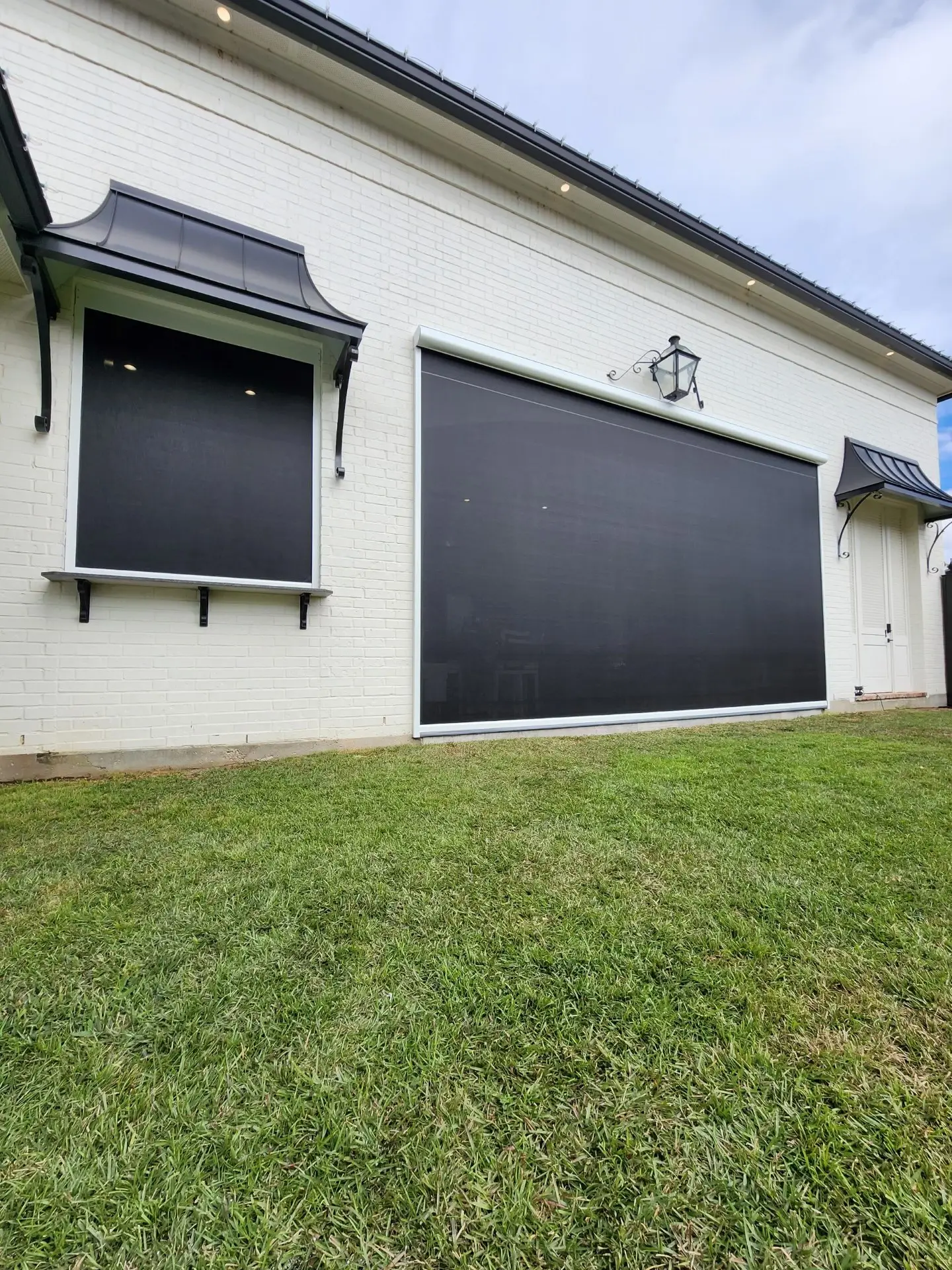 Create a more functional patio space with custom motorized screens built for comfort, protection, and style.