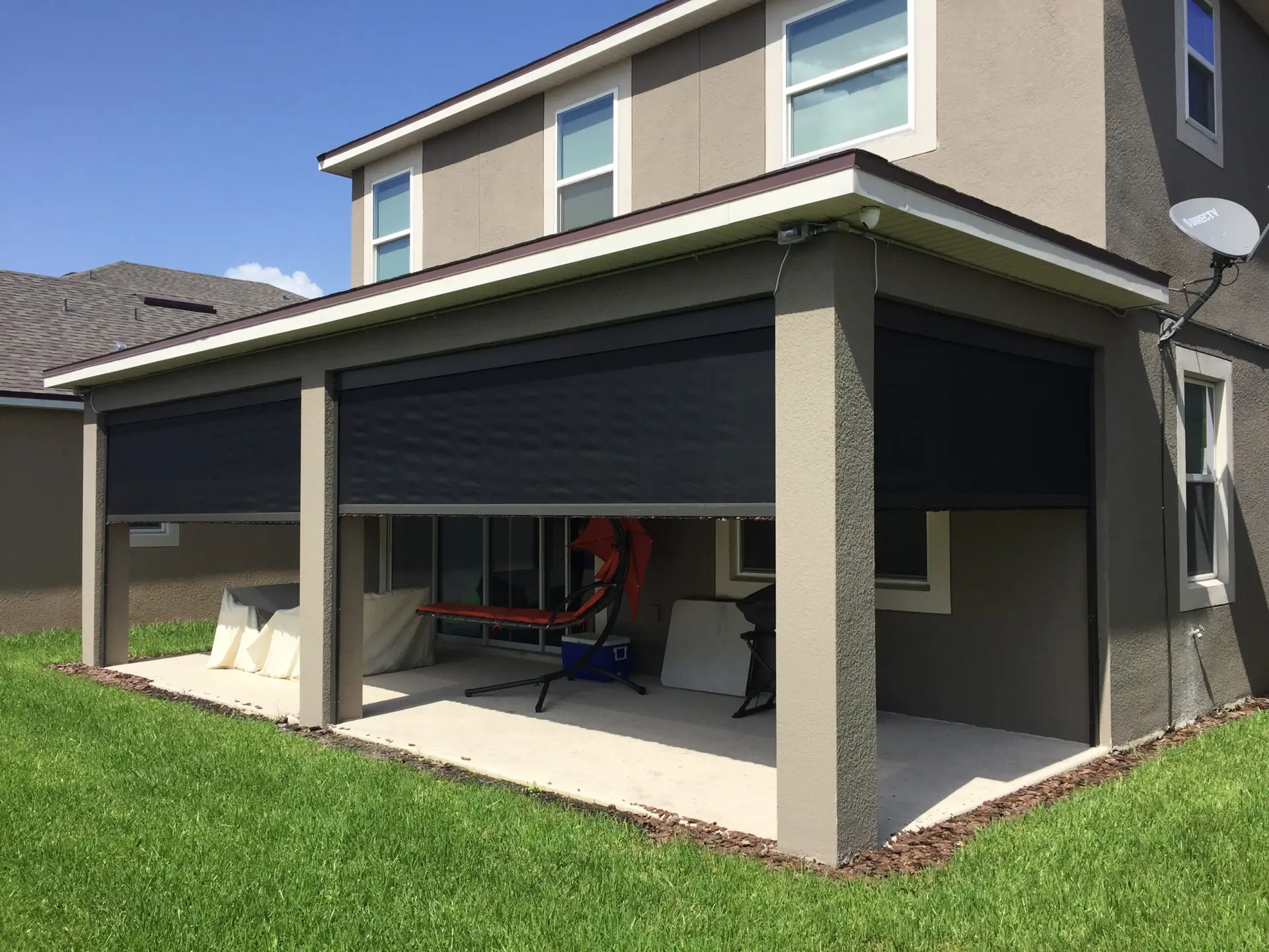 Enjoy privacy and comfort on your patio with retractable screens designed for Florida outdoor living.